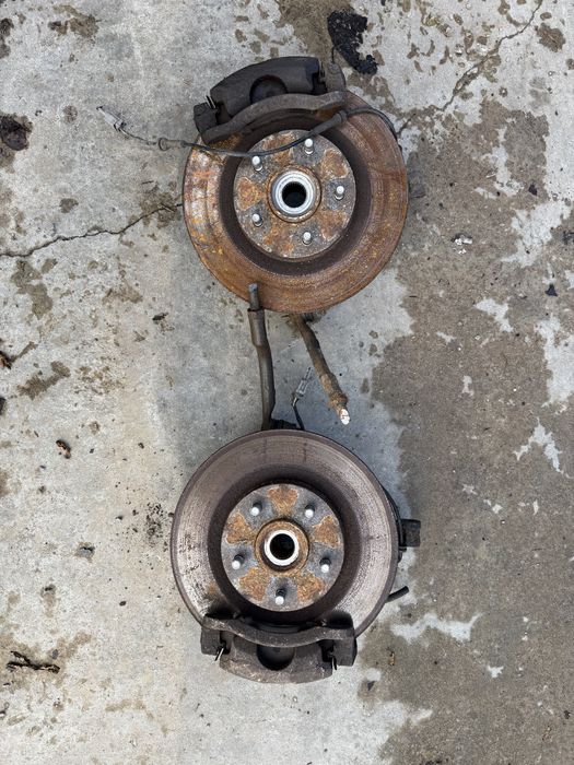 Шенкели с лагер главини/ апарати и дискове Nissan X-trail T31