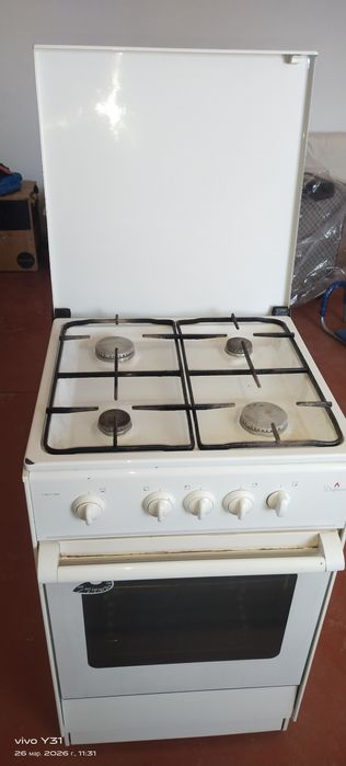 Газ Плита продам..