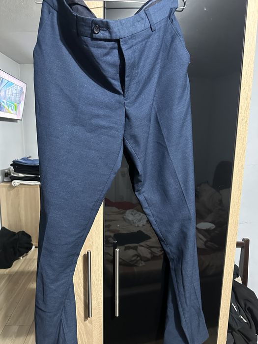 Vand pantaloni barbati