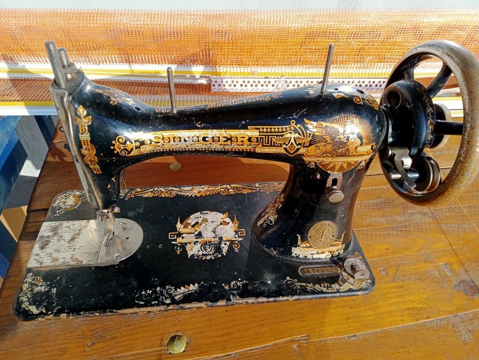 Mașină de cusut Singer