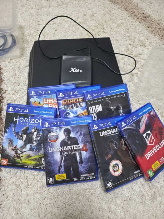 Продам sony playstation 4 pro с играми