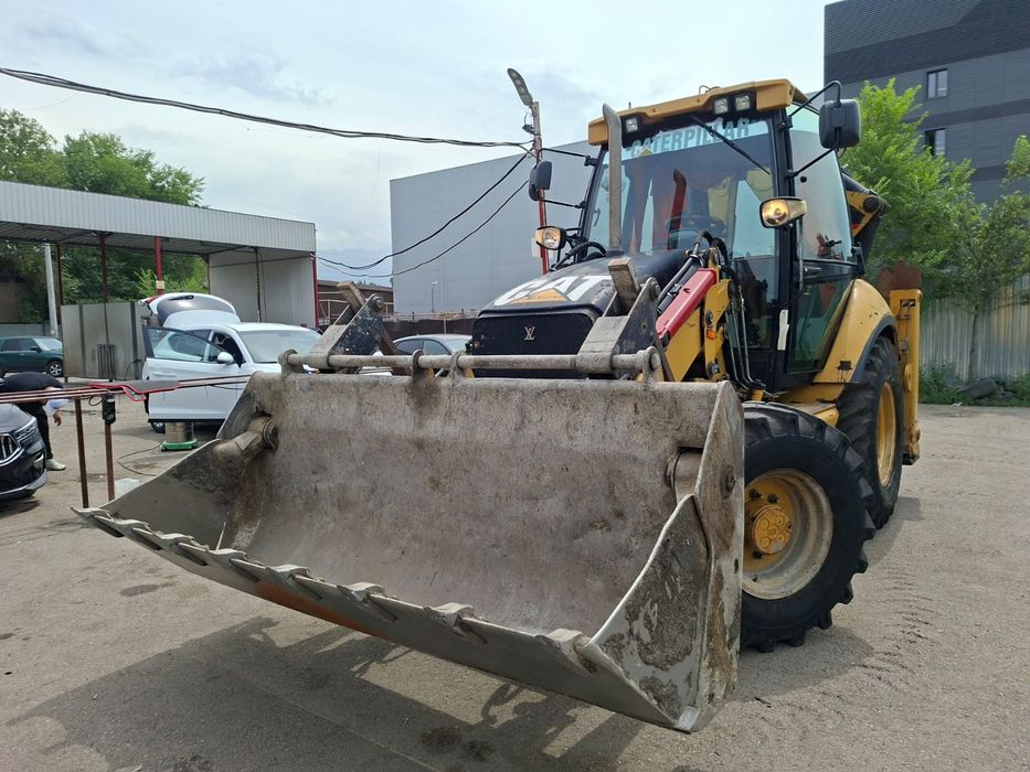 Продам эксковатор погрузчик CAT 432 Е