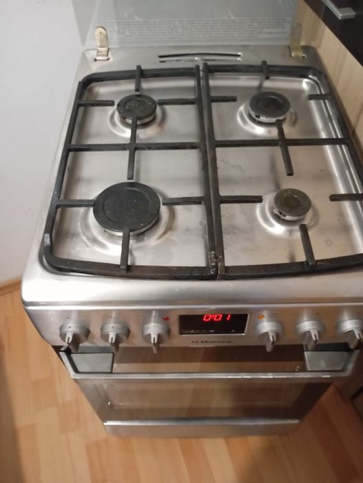 Aragaz  Hansa de inox cu rotisor.