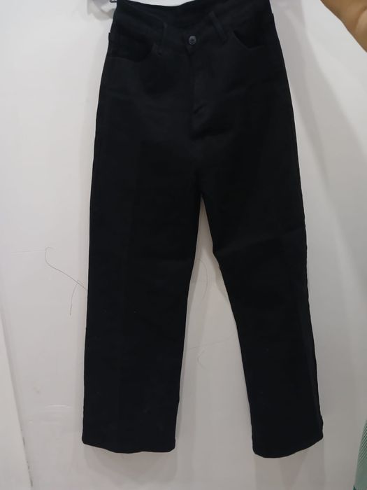 Одежды ,пальто,брюки,сумка.