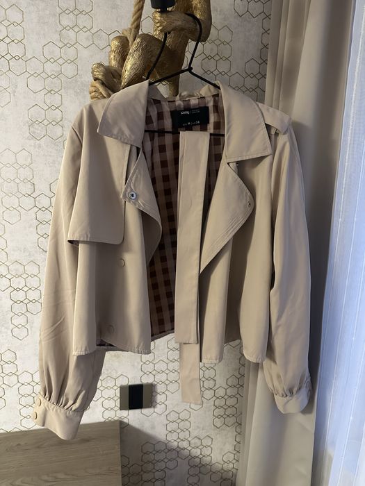 Потници и тренчкот