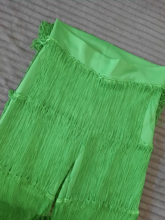 Pantaloni eleganti cu franjuri