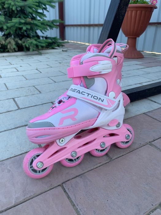 Роликовые коньки