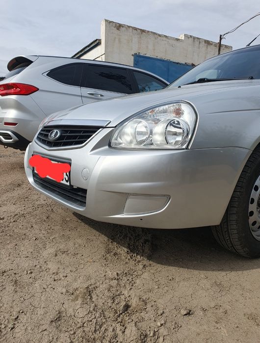 Продам передний Бампер на Приору