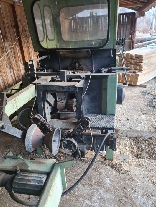 Utilaj prelucrare lemn rotund ,grinda pe patru fete automatizat