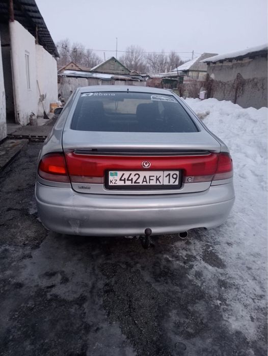 Машина мазда кронс