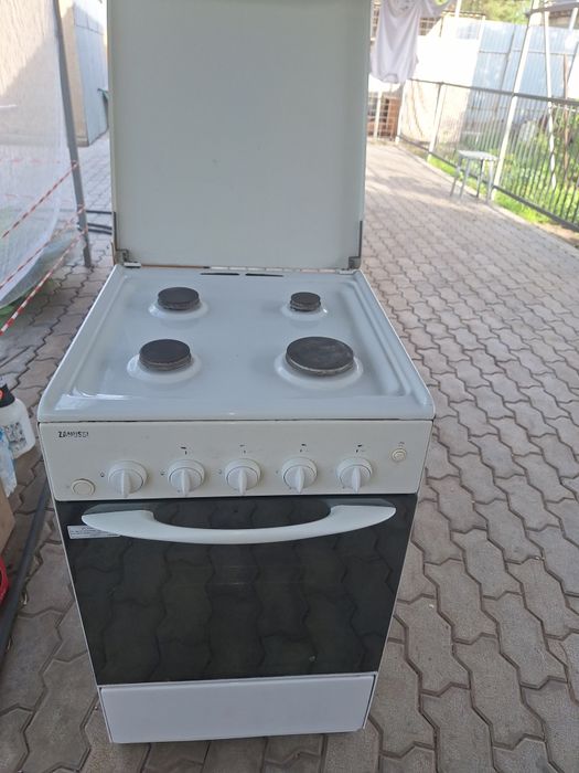 Продам газовая плита zanussi
