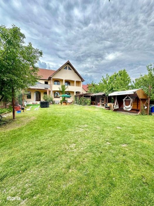 Casa 5 camere,teren 700 mp, foisor si gratar,Micesti