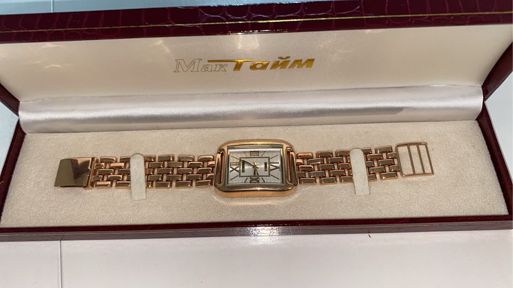 Золотые часы Мактайм