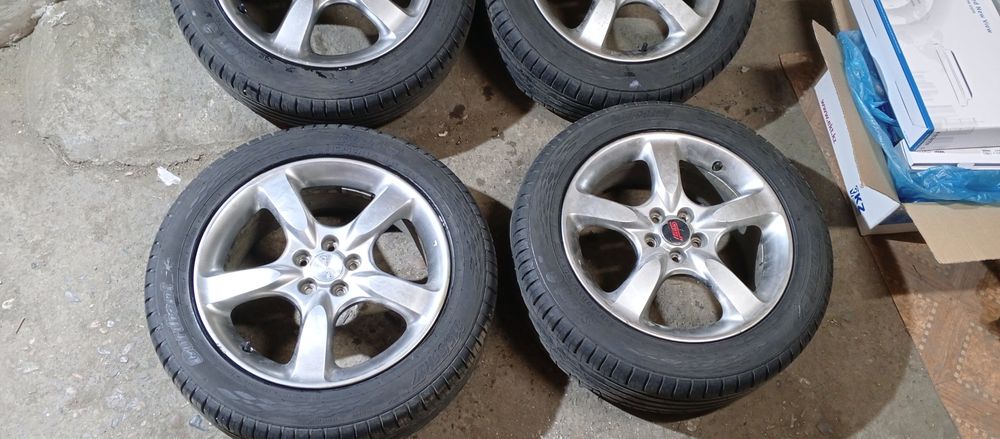 Продам диски с резиной летней Субару