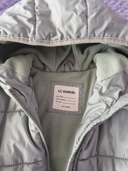 Продам осеннюю куртку на девочку 12-14лет