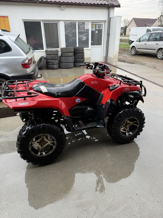 Vând Suzuki king quad