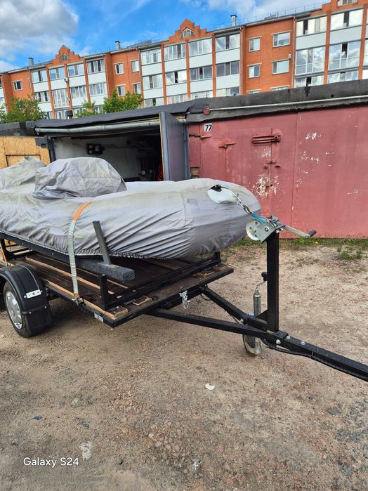 Лодку с подвесным мотором