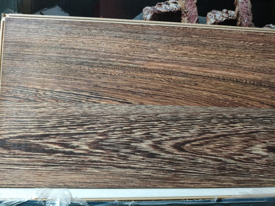 Продам ламинат б/у 70м²