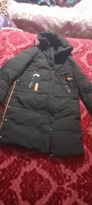 Продам женские зимние куртку