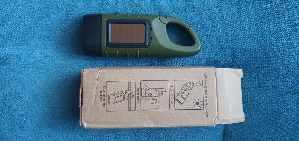 Резервный фонарик с динамо .