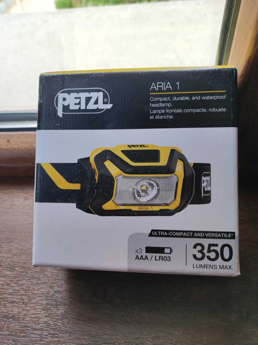 Компактен водоустойчив челен фенер PETZL
