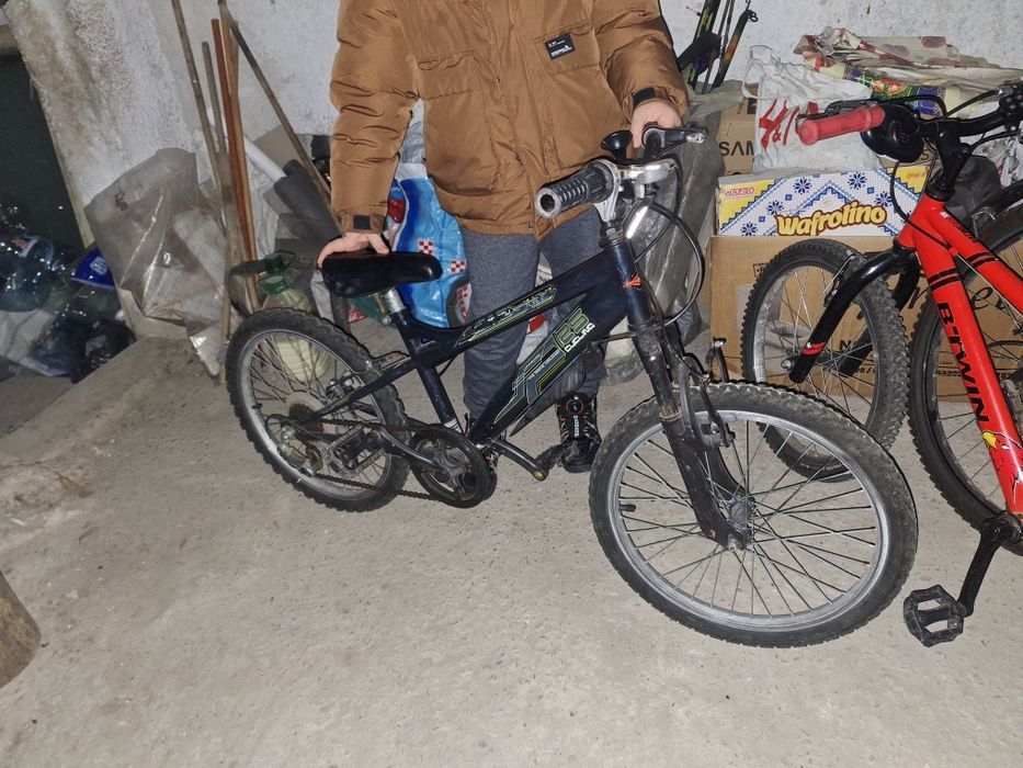 Vand bicicleta cu roti pe 20