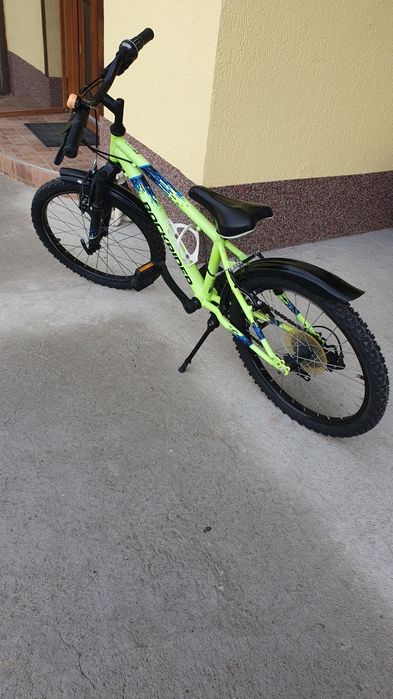 Vând bicicleta în stare impecabila cu roti de 20pentru copii