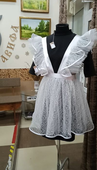 Школьные фартуки в ассортименте