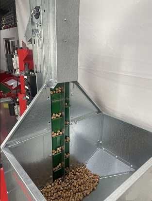 Sistem automat spargere nuci și alune cu separarea miezului de coaja