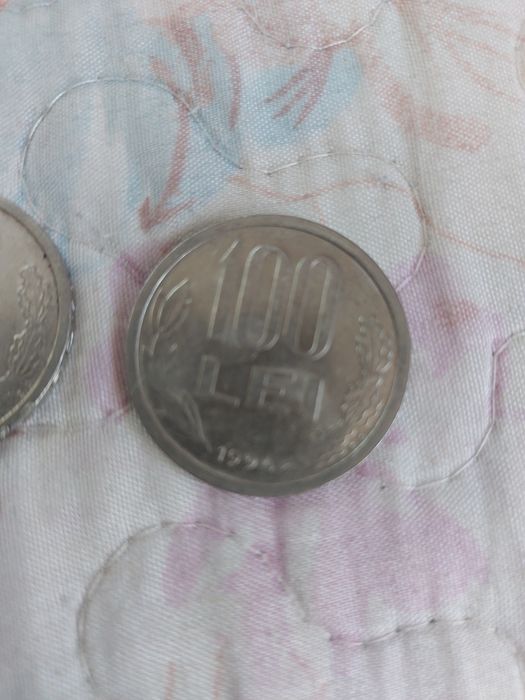 Vand monede vechi de 100 lei