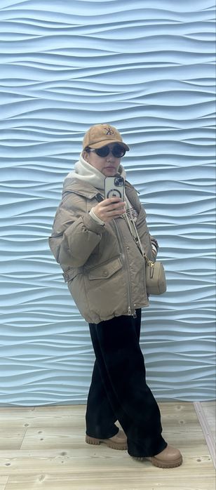 Куртки пуховики.