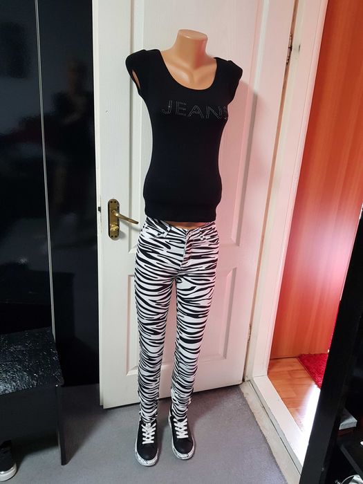 Blugi animal print s noi