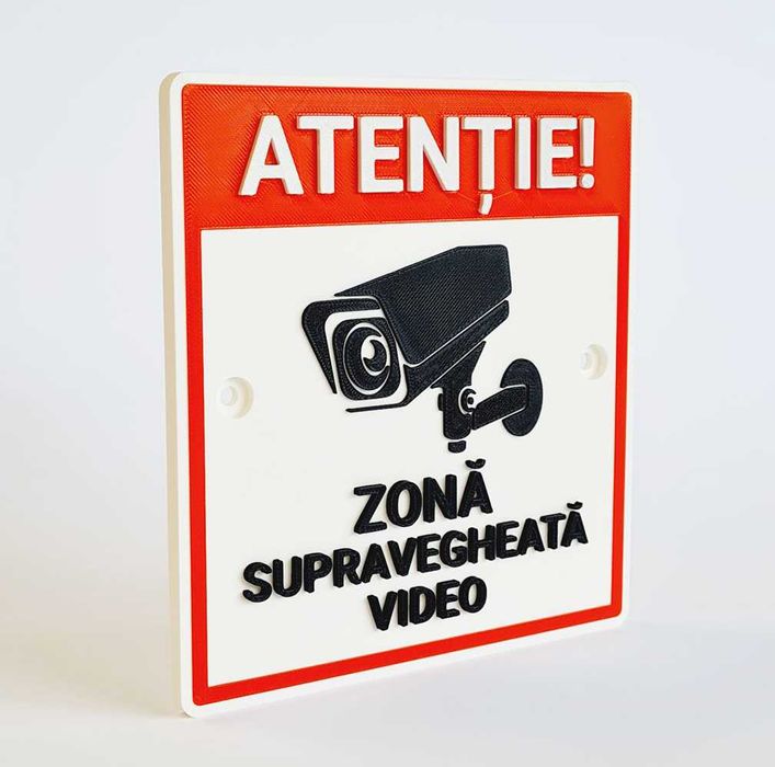 Indicator de avertizare: „Atenție! Zonă supravegheată video.”