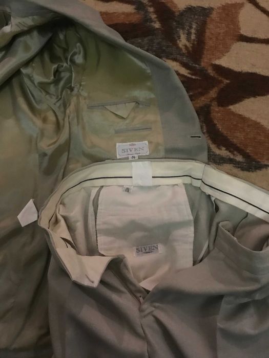 Продавам  костюм - сако и панталон размер 52/176