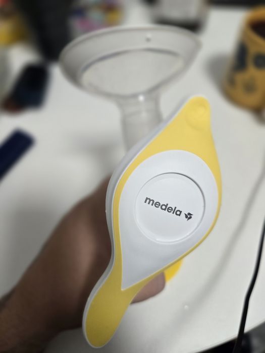 Механический молокоотсос