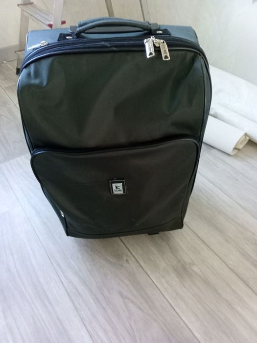 Чемодан дорожный