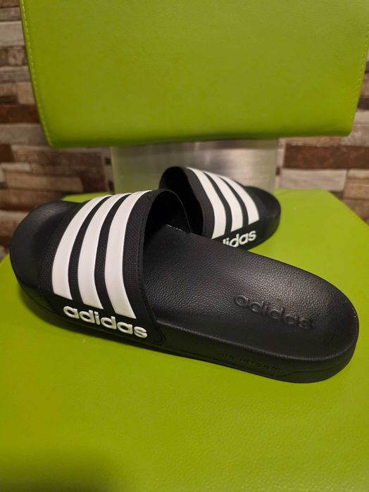 Slapi adidas barbati noi Elvetia
