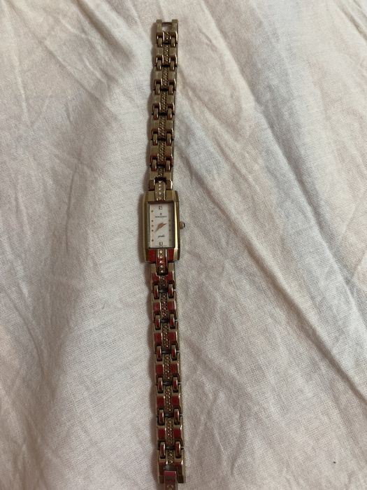 Часы романсон 5000