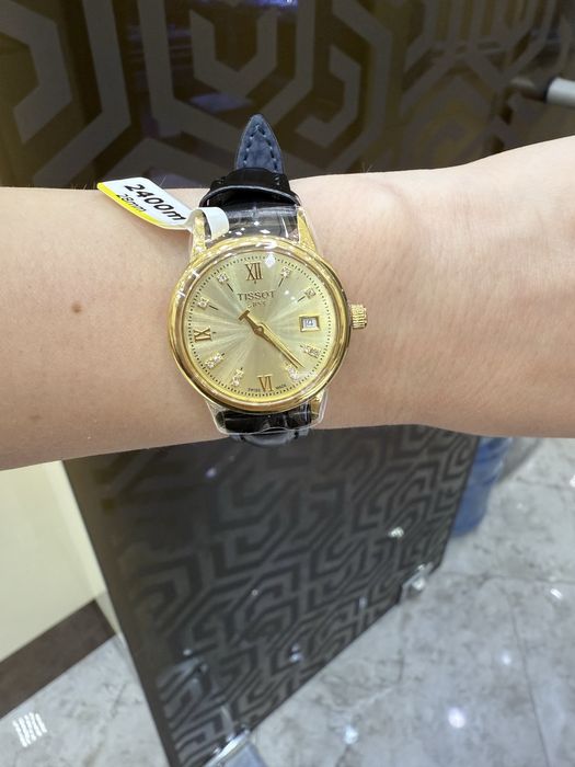 Золотые часы Tissot