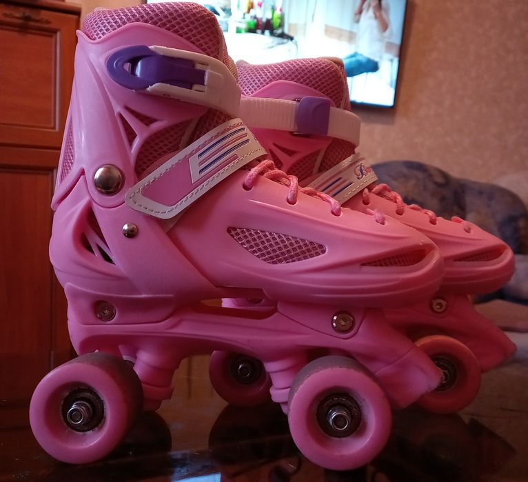 Роликовые коньки