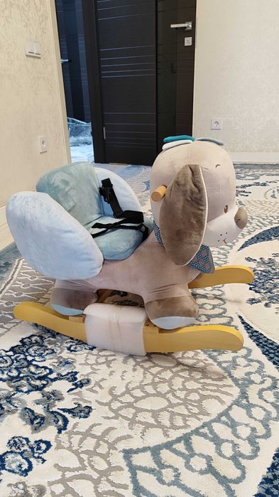 Детская игрушка качели