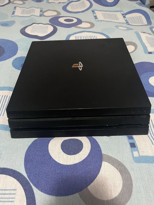 Ps 4 pro plus un joc la alegere