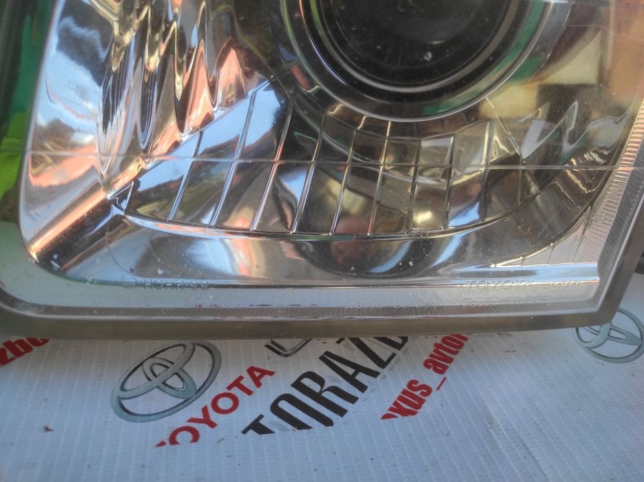 Фара левая LX470 стекло