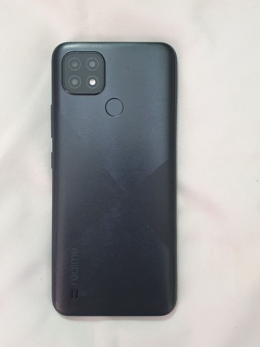 Tel. Realme C21.