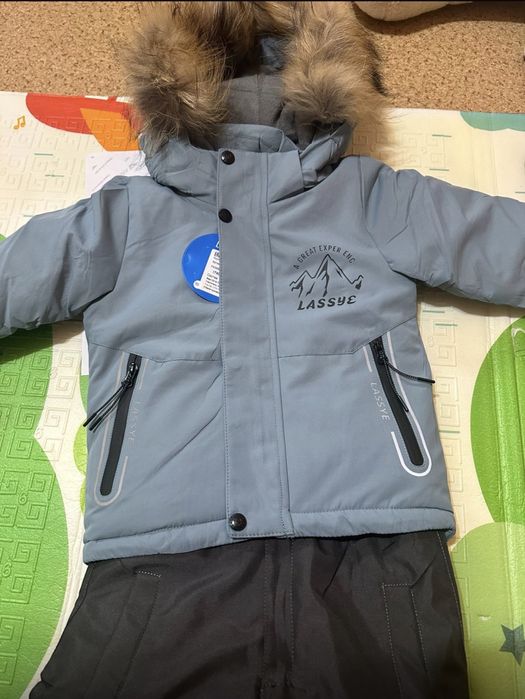 Продам новый детский комбинезон