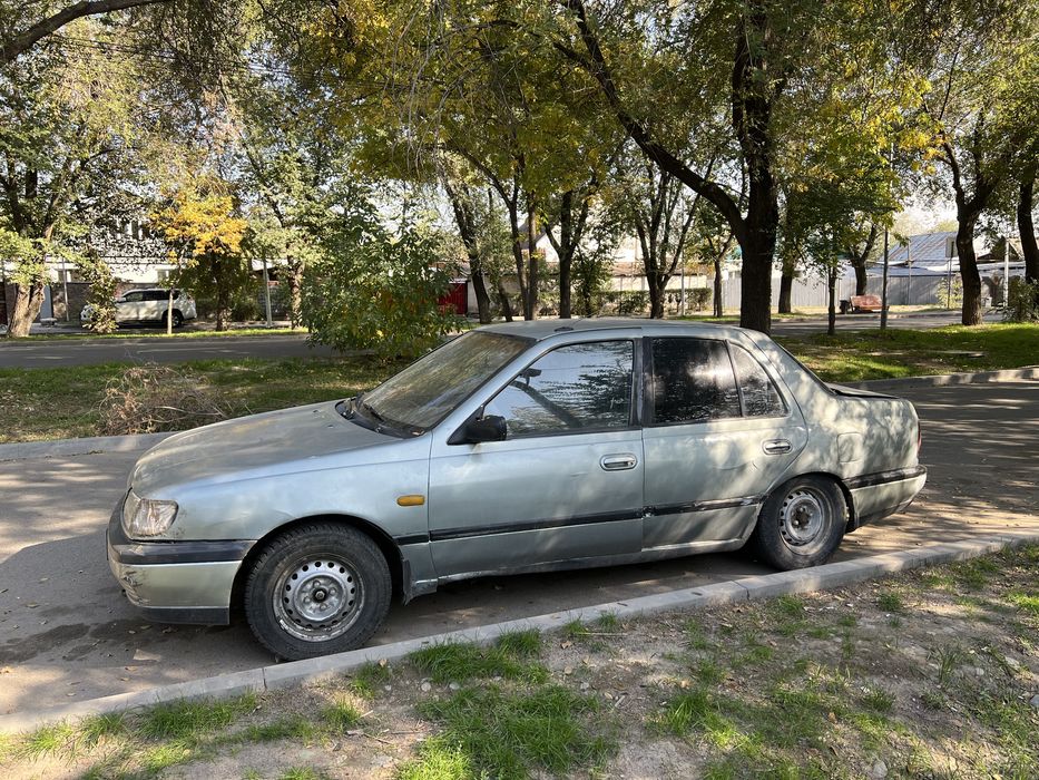 Машина ниссан сани