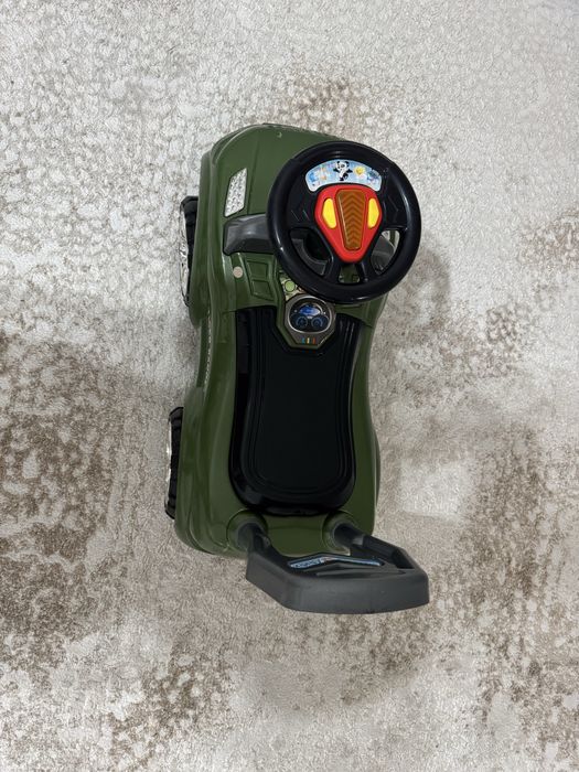 Толокар с музыкальным рулем