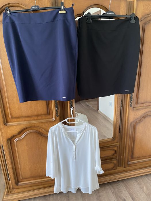 Set de 2 fuste conice si bluza eleganta cu dimensiuni afisate