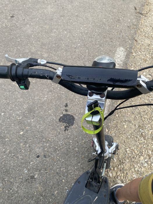 Trotineta electrica cu transmitie pe lant
