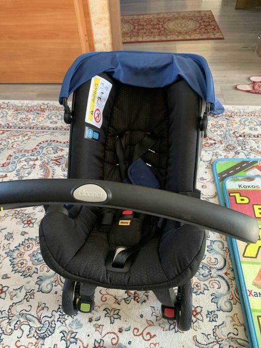 Продам  Коляска-автокресло Doona Royal,